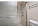 Updated shower showcasing tiled walls, rainfall showerhead, and glass door at 5713 Whiteridge Ave, Las Vegas, NV 89107