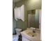 Bathroom features a vanity sink, toilet, mirror, and shower/tub combo at 6196 W University Ave, Las Vegas, NV 89103