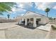 Outdoor space highlighting a covered patio and a spacious yard with potential for garden or play areas at 628 Bay Bridge Dr, North Las Vegas, NV 89032