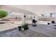 Spacious backyard patio with barbecue area and desert landscaping at 628 Bay Bridge Dr, North Las Vegas, NV 89032