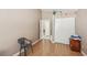 Bedroom with closet, neutral paint, and modern vinyl flooring at 628 Bay Bridge Dr, North Las Vegas, NV 89032