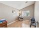 Cozy bedroom with wood-look flooring and neutral paint at 628 Bay Bridge Dr, North Las Vegas, NV 89032