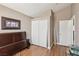 Bedroom featuring closet with sliding doors and wood-look flooring at 628 Bay Bridge Dr, North Las Vegas, NV 89032