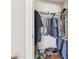 Walk-in closet featuring an organized arrangement of clothing and shoes at 628 Bay Bridge Dr, North Las Vegas, NV 89032
