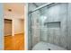 Renovated bathroom featuring a glass shower with a tiled surround at 6315 Eldora Ave, Las Vegas, NV 89146