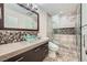 Stylish bathroom featuring a glass vessel sink and glass enclosed shower at 6315 Eldora Ave, Las Vegas, NV 89146