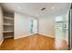 Bedroom featuring wood floors, recessed lights, and en suite bathroom at 6315 Eldora Ave, Las Vegas, NV 89146