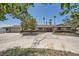 Charming single-story home with mature landscaping, brick accents, and a spacious circular driveway at 6315 Eldora Ave, Las Vegas, NV 89146