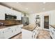 Modern kitchen features stainless steel appliances, granite counters, and center island at 6315 Eldora Ave, Las Vegas, NV 89146