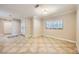 Spacious living area featuring tile floors, crown molding, and seamless flow to other rooms at 6315 Eldora Ave, Las Vegas, NV 89146
