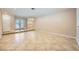 Open-concept living area featuring tile flooring and seamless flow to the foyer with ornate doors at 6315 Eldora Ave, Las Vegas, NV 89146