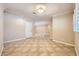 Spacious living room with tile floors, neutral walls, and plenty of natural light at 6315 Eldora Ave, Las Vegas, NV 89146