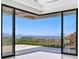 Outdoor balcony offering panoramic views of the city and mountains beyond at 641 Majestic Rim Dr, Henderson, NV 89012