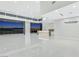 Bright, open living room with expansive windows showcasing panoramic city views and modern finishes at 641 Majestic Rim Dr, Henderson, NV 89012