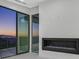 Corner fireplace in living room with access to the balcony at 641 Majestic Rim Dr, Henderson, NV 89012