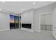 Bedroom featuring modern fireplace and balcony access at 641 Majestic Rim Dr, Henderson, NV 89012