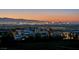 Panoramic night view showcasing the city skyline and the landscape at 641 Majestic Rim Dr, Henderson, NV 89012