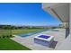 Infinity pool and fire pit with community golf course and city views at 641 Majestic Rim Dr, Henderson, NV 89012