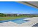 Infinity pool and city views with community golf course in the background at 641 Majestic Rim Dr, Henderson, NV 89012