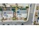 Aerial view of the property showing its roof, solar panels, and surrounding landscaping at 7051 Denio Island St, North Las Vegas, NV 89084