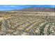 Wide neighborhood aerial view highlighting the street layout and desert landscape at 7051 Denio Island St, North Las Vegas, NV 89084