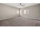 Bedroom featuring neutral walls, plush carpet, and natural light at 7051 Denio Island St, North Las Vegas, NV 89084