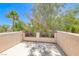 Balcony providing an intimate outdoor space with scenic views of trees and foliage at 708 Point Bluff St, Henderson, NV 89002