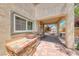 Outdoor kitchen with stainless steel grill, stone counter, and access to the covered patio at 708 Point Bluff St, Henderson, NV 89002