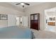 Primary bedroom leading to ensuite with view of soaking tub at 7411 Brittlethorne Ave, Las Vegas, NV 89131
