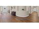 Stately foyer boasting hardwood flooring and providing an inviting view of the rest of the home at 7411 Brittlethorne Ave, Las Vegas, NV 89131