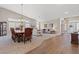 Spacious, open-concept living room and dining room area filled with ample natural light and neutral tones at 7411 Brittlethorne Ave, Las Vegas, NV 89131
