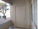Back entrance with access to the property, featuring a neutral-toned door and window at 75 N Valle Verde Dr # 411, Henderson, NV 89074