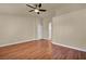 Spacious bedroom features hardwood floors and a ceiling fan for added comfort at 7824 Faith Ct, Las Vegas, NV 89131
