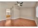 Spacious bedroom featuring wood floors and an ensuite bathroom at 7824 Faith Ct, Las Vegas, NV 89131