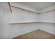 Walk-in closet featuring plenty of shelving for ample storage at 7824 Faith Ct, Las Vegas, NV 89131