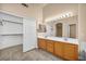 Walk-in closet equipped with custom shelving and ample storage space at 7824 Faith Ct, Las Vegas, NV 89131