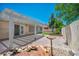 Large open patio features a water feature, brick flooring and pergola at 7824 Faith Ct, Las Vegas, NV 89131