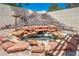 Beautiful backyard water feature with cascading fountain and rock accents at 7824 Faith Ct, Las Vegas, NV 89131