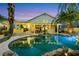 Sparkling backyard pool with covered patio and barbeque at 8224 Fawn Meadow Ave, Las Vegas, NV 89149