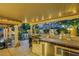 Backyard with a pool and an outdoor kitchen area at 8224 Fawn Meadow Ave, Las Vegas, NV 89149
