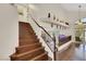 Beautiful staircase leading to the second floor, offering a view of the living area at 8224 Fawn Meadow Ave, Las Vegas, NV 89149