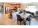 Eat-in kitchen features a breakfast bar, stainless steel appliances, and lots of cabinet space at 8305 Minots Ledge Ave, Las Vegas, NV 89147