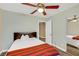 Cozy bedroom featuring a ceiling fan, closet, and queen size bed at 8481 Lambert Dr, Las Vegas, NV 89147
