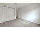 Bedroom featuring carpet flooring, a spacious closet, and neutral walls at 8600 W Charleston Blvd # 1128, Las Vegas, NV 89117