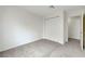 Bedroom featuring carpet flooring, a closet, and neutral walls at 8600 W Charleston Blvd # 1128, Las Vegas, NV 89117