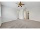 Bedroom featuring carpet flooring, neutral walls, closet, and ceiling fan at 8600 W Charleston Blvd # 1128, Las Vegas, NV 89117