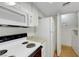 Kitchen featuring modern appliances and a laundry area, perfect for efficient living and convenience at 8600 W Charleston Blvd # 1128, Las Vegas, NV 89117