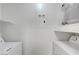Practical laundry area with modern washer and dryer, perfect for easy chore management at 8600 W Charleston Blvd # 1128, Las Vegas, NV 89117