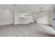 Expansive living area with neutral carpet, and open floor plan to the kitchen at 8600 W Charleston Blvd # 1128, Las Vegas, NV 89117