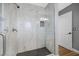 Bathroom featuring a large marble shower with dark tile and frameless glass at 928 Aspen Valley Ave, Las Vegas, NV 89123